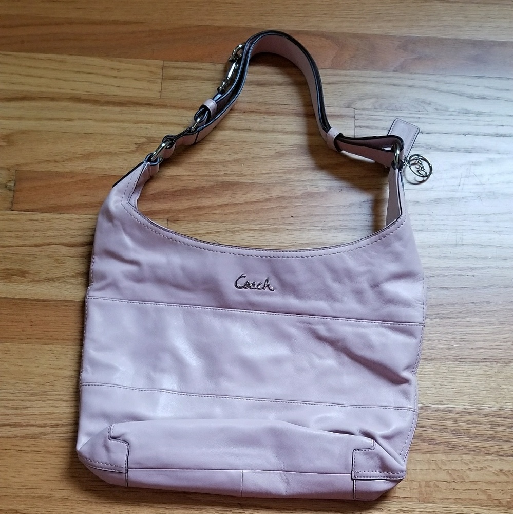 Pierced leather duffel